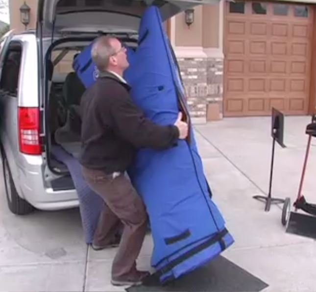 A floor mat or carpet remnant can help protect your harp from pavement during loading.